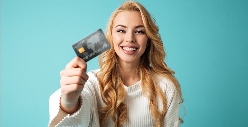 girl holding bank credit card